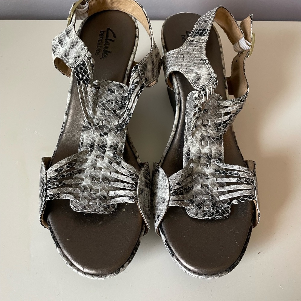Clarks “bendable” black & white sandals.